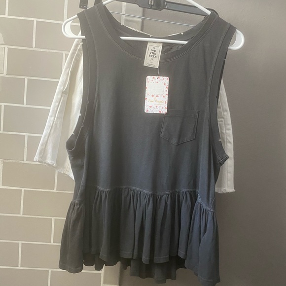 Free People Tops - Free people Tank top washed/ worn peplum NWT